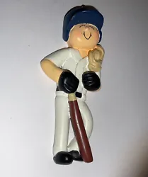 Christmas Basebal Girl player Ornament. Does have few marks. Approximately 3 3/4”. (Z1)