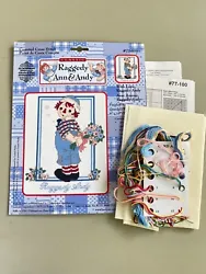 This is a Raggedy Ann & Andy cross stitch kit titled With Love. The kit has been opened but is complete and in good...