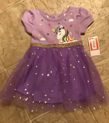 This is a gorgeous little girls purple and gold unicorn tutu dress. It has a keyhole in the back with a bow on the top....