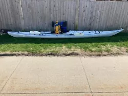 Sea Lion Sea Kayak. (Barely Used / Great Condition). 2 Wheeler (needs repair). 2 Piece Paddle.