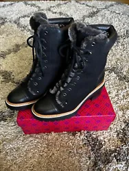 The boots are in excellent conditions. Tory Burch Miller Ankle Combat Boots. Round-Toes with Fur Trim. Lace-Up Closure...