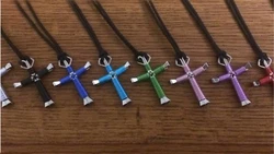 COLORED WIRE - ADJUSTABLE SIMULATED LEATHER CORD. 4 NAILS MAKE UP THE CROSS PENDENT.