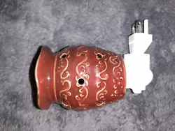 scentsy warmer plug in.