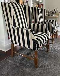 Vintage, solid wood, very sturdy wingback chairs. Reupholstered in modern heavy duty ticking striped cotton circa 2016....