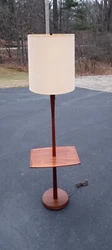 Very good used condition. Cord, socket and shade appear to be all original and it works great. The lamp has a finish...