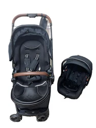 Stroller and Car seat combo. Slightly used infant car seat and bassinet combo. Easily interchangeable. 5 point safety...