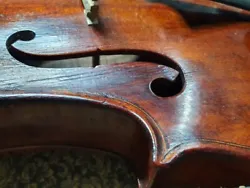 OLD VIOLIN IN THE OLD CASE. The length of the back is 355 mm. In general condition. The case is old, battered, has a...