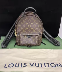 The wrap-around zippers open to a black fabric interior with a patch pocket. You may be able to treat with leather...
