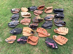 There is a good mixture of youth and adult size gloves. there is 21 right-handed and 5 left-hander throwers. there is...