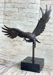 Large bronze Eagle sculpture by Milo. Take this opportunity to add a touch of wild beauty to your space and allow the...