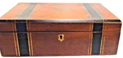 The little piece of wood needs to be glued back into the spot similar to the other. We have this gentlemans writing...
