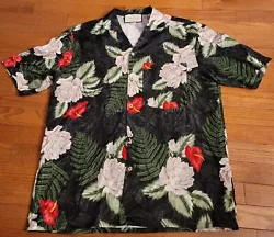 Model #: 619073-ZAEMQ-1030. Made in Italy. Fine 65% viscose, 35% silk fabric. Allover Hawaiian Dream floral print with...