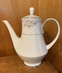 For sale is a Noritake Tarkington Coffee Pot. Platinum edge, pink flowers and gray leaves. Actual 1986-1993. Condition...