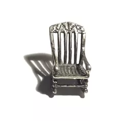 A very dear little miniature of an antique sterling silver rocker in a realistic 3D representation. Embossed pattern on...