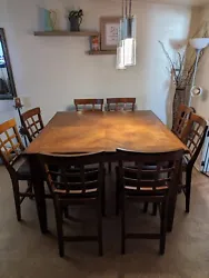 Wooden 8 high chair set dining table in great condition. For my information contact [phone removed by eBay]