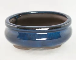 Blue stain glazed. 0.4 quart soil needed. Due to the light and monitors difference, the items color may be slightly...