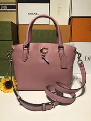 💕 This refined pebble leather Remi satchel is a roomy go-everywhere bag finished with our Signature hardware for an...