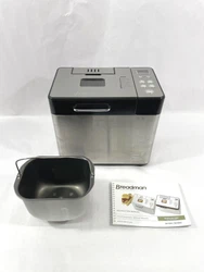 This is a Breadman bread-making machine model BK10506. It is silver stainless steel with black accents. It has 12 bread...