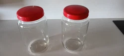 Grand bocal en verre transparent avec son couvercle en bakélite rouge x2. Envoi rapide et soigné.