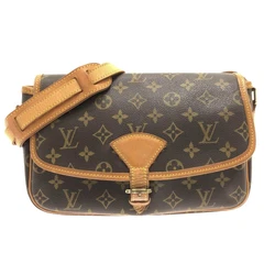 DateCode / Stamp. StyleShoulder Bag. Shoulder strap (length adjustable, material: tanned leather). AccessoriesDust Bag....