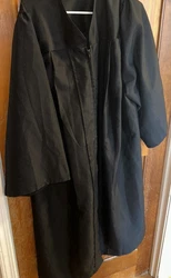 Crafted from high-quality materials, this black graduation gown features a comfortable and durable design thats perfect...