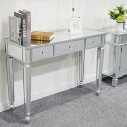 This is our 3 drawers glass mirrored makeup table, which has a beautiful appearance. With its mirrored finish, it...