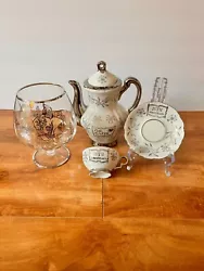 25th Anniversary gift set - espresso cup, saucer, coffee pot and fancy glass.