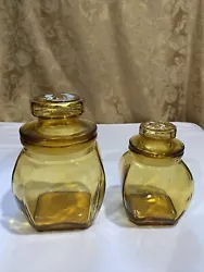 2 Vtg Light Amber Apothecary Jars Starburst Top. Excellent preowned condition. No cracks or chips! The larger one is...