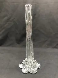 Vintage Clear Glass Ribbed Swung 10” tall Vase. No chips or cracks, great condition.Photos are part of the...