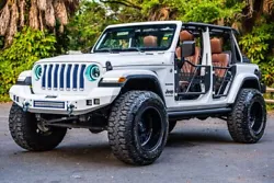 YEAR: 2019 COLOR: High Gloss White TOP: Soft Top - Convertible TRIM: SoFlo Lifted Custom Wrangler LIFT: 3.5” TIRES:...