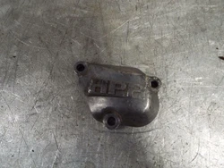 1988-91 HONDA CR250R L/H EXHAUST VALVE POWER VALVE COVER IS IN GOOD CONDITION WITH FEW MARKS FROM USE AND DOES NOT HAVE...