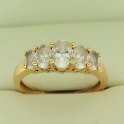 14K Yellow Gold 5 Stone Ring. The CZs are a little scratched but overall the ring is beautiful. The ring can be worn as...