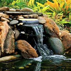 When the sun goes down, the lights go on and a beautiful blue or white glow is cast upon the water cascade. 14