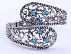 This exquisite bracelet is a masterpiece by Carolyn Pollack for Relios. A flexible hinge provides about 1-3/4