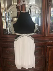Speechless black and white dress, juniors size 3. Flawless condition with no issues.Measures 29” long (not including...