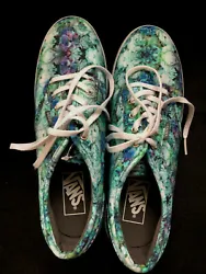 Vans size 8 sneakers. New without box. Pretty floral blue/green colors. Color is more vibrant than the pic shows. Wear...
