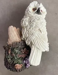 A white owl figurine with lots of details on the stump where he is perched. Weigh 12 ounces. Shipped with USPS mail.