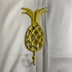 Add a touch of whimsy to your farmhouse-themed home with this vintage yellow pineapple wall hook. Made of heavy-duty...