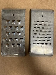 Vintage Super Patented Cheese Graters Lot Of 2. Medium And Large. Condition is Used. Shipped with UPS Ground.