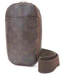 LOUIS VUITTON Gange. Louis Vuitton monogram canvas and alcantara lining. Monogram canvas has light discoloration and...