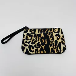 Gently used wristlet in good condition.