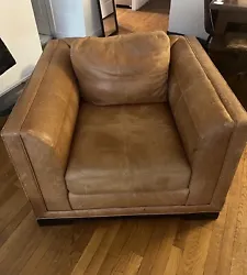 ABC furniture Oversized Brown Leather Chair and ottoman. Original owner. Purchased newScratched and could use...