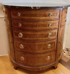 Substantial Henredon bow front dresser with marble top and generous storage throughout. A big piece!