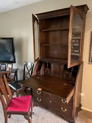 Secretary desk and chair.  Some scratches.  Leg piece of desk and chair off but included for repair.  