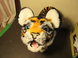 A electronic plush toy - FurReal Friends - Roarin Tyler My Playful Tiger. It will need 4 C batteries to operate, it has...