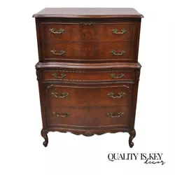 Overall very nice. Details : 5 dovetailed drawers, beautiful wood grain, cabriole legs, great style and form. Age :...