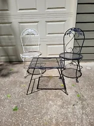 Vintage Wrought Iron Patio Furniture Set Table & 2 Chairs. Both chairs are very stable and functional. We have other...