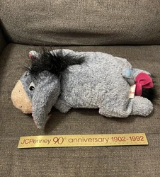 This adorable Eeyore plush stuffed animal from the Disney Store is perfect for any fan of Winnie the Pooh and his...