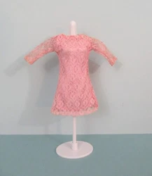 It is in Very Good Condition with a shoulder seam loose. The long sleeves have yellowed. (Dress only.). Near Mint -...