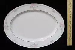 This large oval platter is made by Noritake for the Legendary line with the Tarkington. pattern, which shows a lovely...